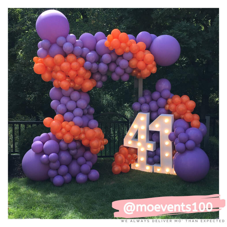 purple and orange balloon garland